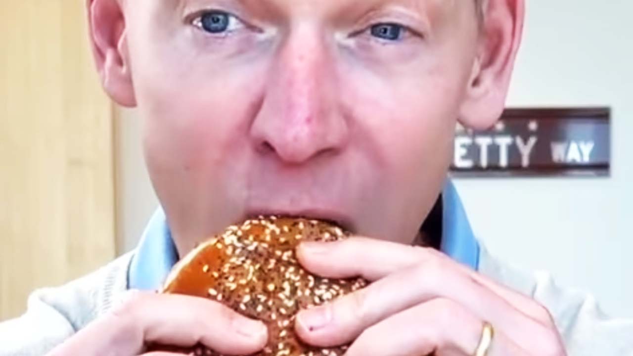 This Video Of The McDonald’s CEO Struggling To Eat The New Big Arch Burger Is Cracking People Up